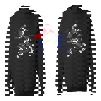 Extreme Santa Riding Flying Dirt Bike Christmas Shirt Sweatshirt - Monsterry