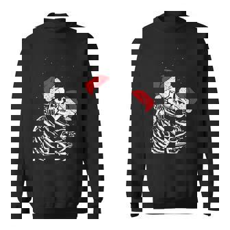 Skeleton Kissing Couple Santa Hat Snow Cool Christmas Sweatshirt - Monsterry