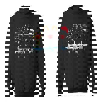 Wine Glasses With Reindeer And Santa And Christmas Lights Sweatshirt - Monsterry