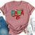 Christmas Mama Coquette Bow Mama Claus Christmas Tree Cake Bella Canvas T-shirt Heather Dark Grey