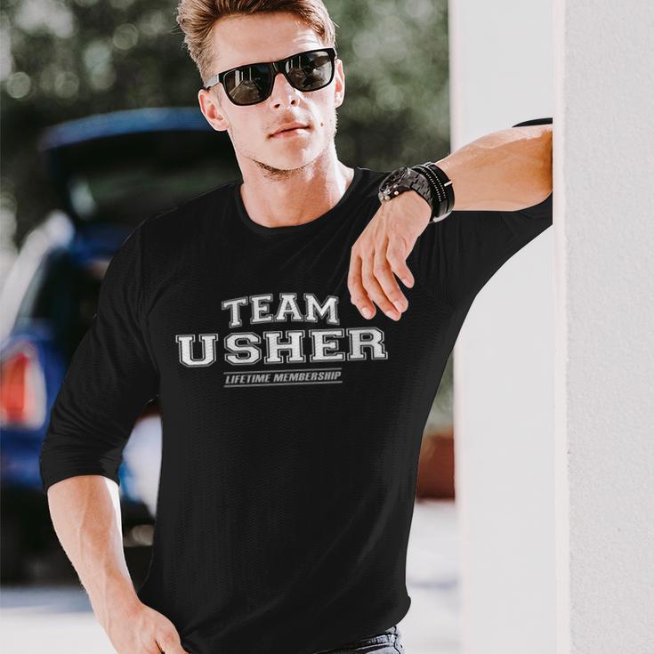 Damen Team Usher Stolzer Familiennachname Nachname Geschenk Mit-Ausschnitt Langarmshirts Geschenke für Ihn