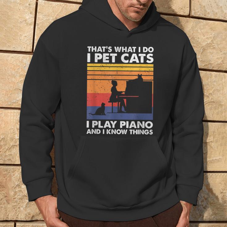 Das Ist Was Ich Mache Ich Streichle Katzen Ich Spiele Klavier Und Ich Weiß Dinge Kapuzenpullover Lebensstil