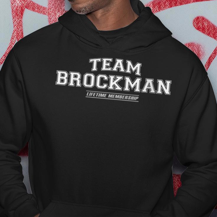 Damen Team Brockman Stolzer Familiennachname Nachname Geschenk Mit-Ausschnitt Kapuzenpullover Lustige Geschenke