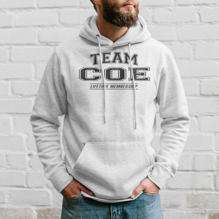 Damen Team Coe Stolzer Familiennachname Nachname Geschenk Mit-Ausschnitt Kapuzenpullover Geschenke für Ihn