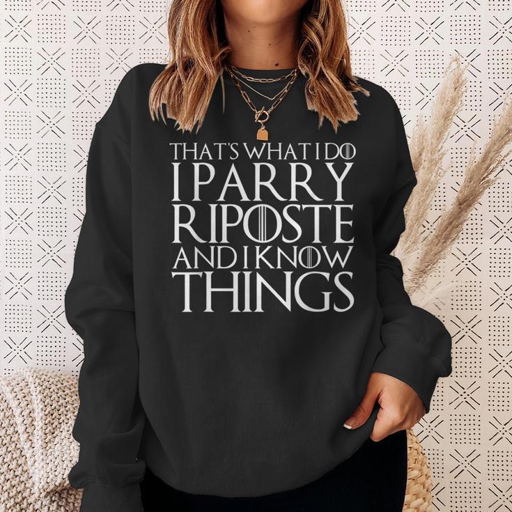 Das Ist Was Ich Mache Ich Pariere Riposte Und Ich Weiss Dinge Sweatshirt Geschenke für Sie