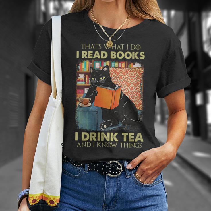 Damen Das Ist Was Ich Tue Ich Lese Bücher Ich Trinke Und Ich Weiß Dinge Mit-Ausschnitt T-Shirt Geschenke für Sie