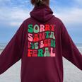Sorry Santa I've Been Feral Groovy Xmas Christmas Women Oversized Hoodie Back Print Maroon Sorry Santa I've Been Feral Groovy Xmas Christmas Women Oversized Hoodie Back Print Maroon